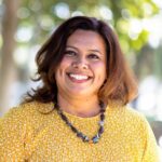 portrait of a beautiful mexican woman at a park